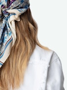 Kaely Denim Jacket - White button-up denim jacket with pockets, raw edges and ‘Love Yourself’ embroidered on the back.