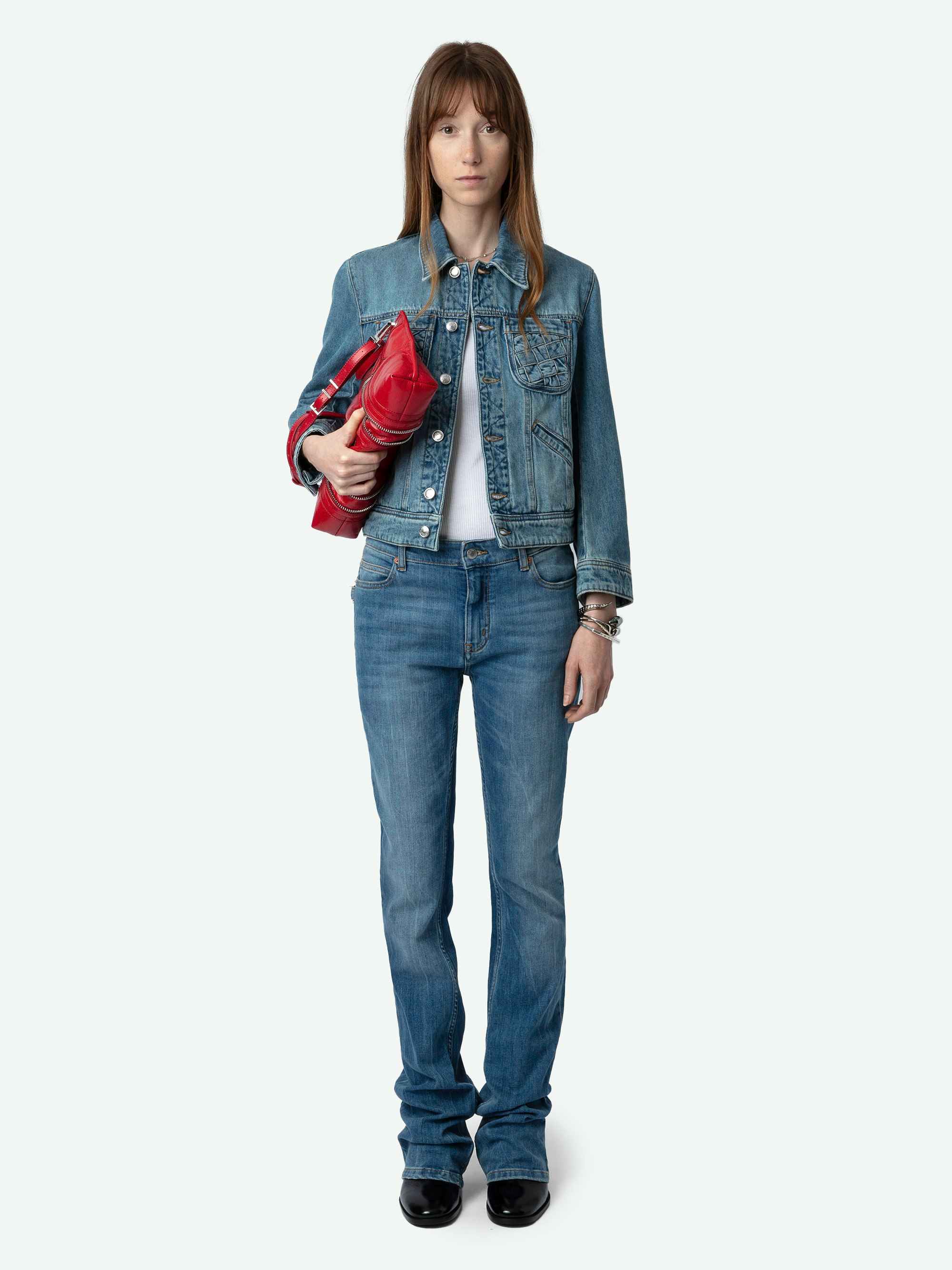 Kioka Denim Jacket - Washed denim jacket with zip and button closure, pockets and braided details.