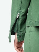 Parka Klimi - Parka in stile militare in cotone lavato, borchie, tasche multiple e firma ad ala sul retro.