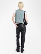 Gillier Denim Vest - This sleeveless denim vest is punctuated with silver studs and a raw edge finish—distressed just right. Layer it over everything, wear it like armor. Bold, free, undeniably Zadig.
