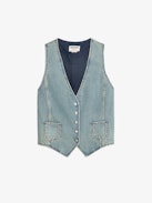Gillier Denim Vest - This sleeveless denim vest is punctuated with silver studs and a raw edge finish—distressed just right. Layer it over everything, wear it like armor. Bold, free, undeniably Zadig.