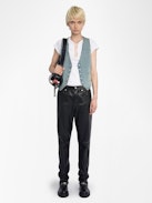 Gillier Denim Vest - This sleeveless denim vest is punctuated with silver studs and a raw edge finish—distressed just right. Layer it over everything, wear it like armor. Bold, free, undeniably Zadig.
