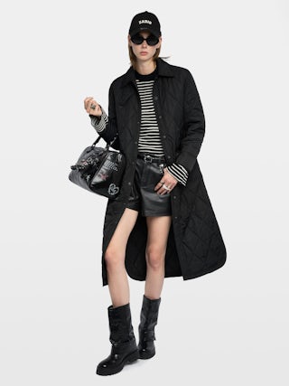 Parka Kina - Parka longue unie matelassée, multi poches et fermeture boutonnée.