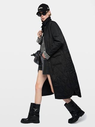 Parka Kina - Parka longue unie matelassée, multi poches et fermeture boutonnée.