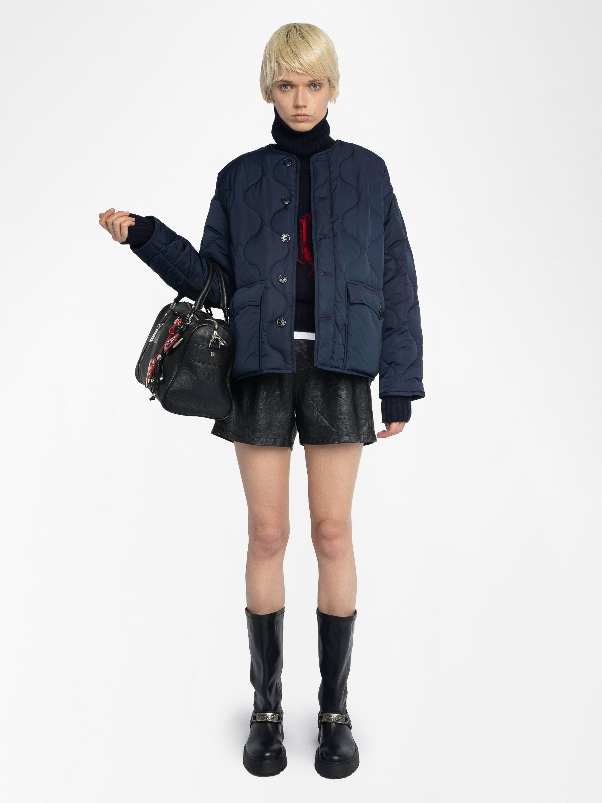 Parka Bunji - Parka corto trapuntato, tasche applicate davanti e chiusura con bottoni.