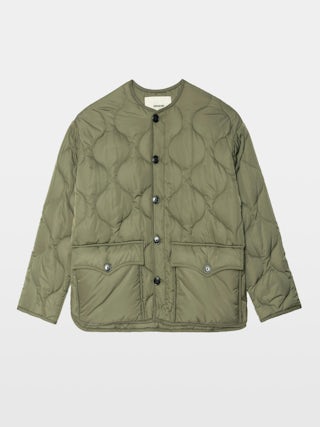 Bunji Short Quilted Parka - Short quilted parka with front patch pockets and button closure.