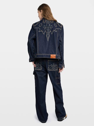 Blouson Bases Denim - Blouson en denim, découpes esprit western, manches longues, multi poches et fermeture boutonnée.
