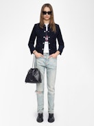 Liam Jacket - Corduroy jacket in plain colour, long sleeves, multiple pockets, button fastening and embossed wings on the back.