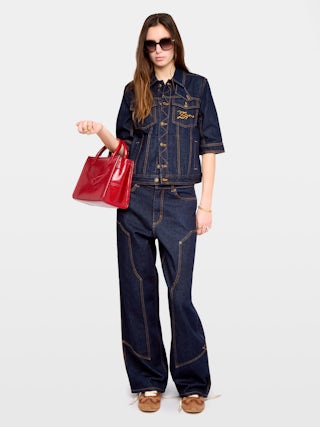 Kyo Denim Jacket - Short-sleeved denim jacket with button fastenings, removable flap and multiple pockets.