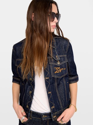 Kyo Denim Jacket - Short-sleeved denim jacket with button fastenings, removable flap and multiple pockets.
