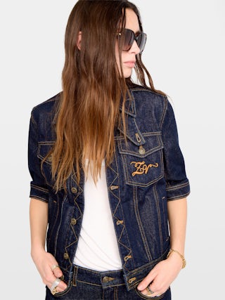 Kyo Denim Jacket - Short-sleeved denim jacket with button fastenings, removable flap and multiple pockets.