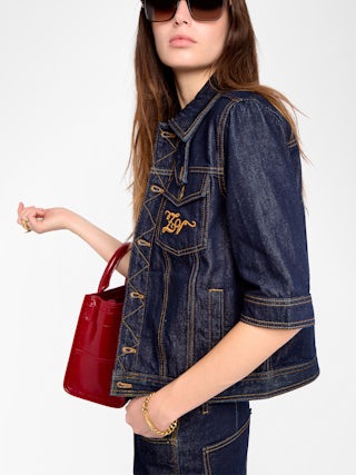 Blouson Kyo Denim - Blouson en denim manches courtes, fermetures boutonnées, pate amovible et multi poches.