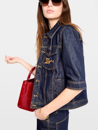 Kyo Denim Jacket - Short-sleeved denim jacket with button fastenings, removable flap and multiple pockets.