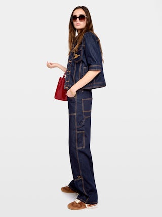 Kyo Denim Jacket - Short-sleeved denim jacket with button fastenings, removable flap and multiple pockets.