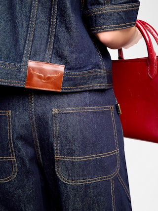 Blouson Kyo Denim - Blouson en denim manches courtes, fermetures boutonnées, pate amovible et multi poches.