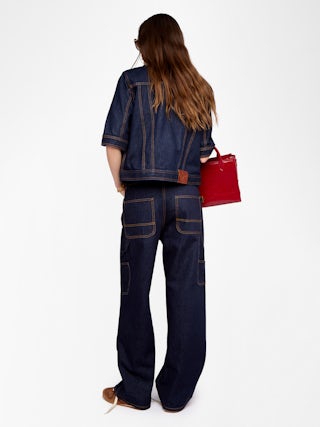 Blouson Kyo Denim - Blouson en denim manches courtes, fermetures boutonnées, pate amovible et multi poches.