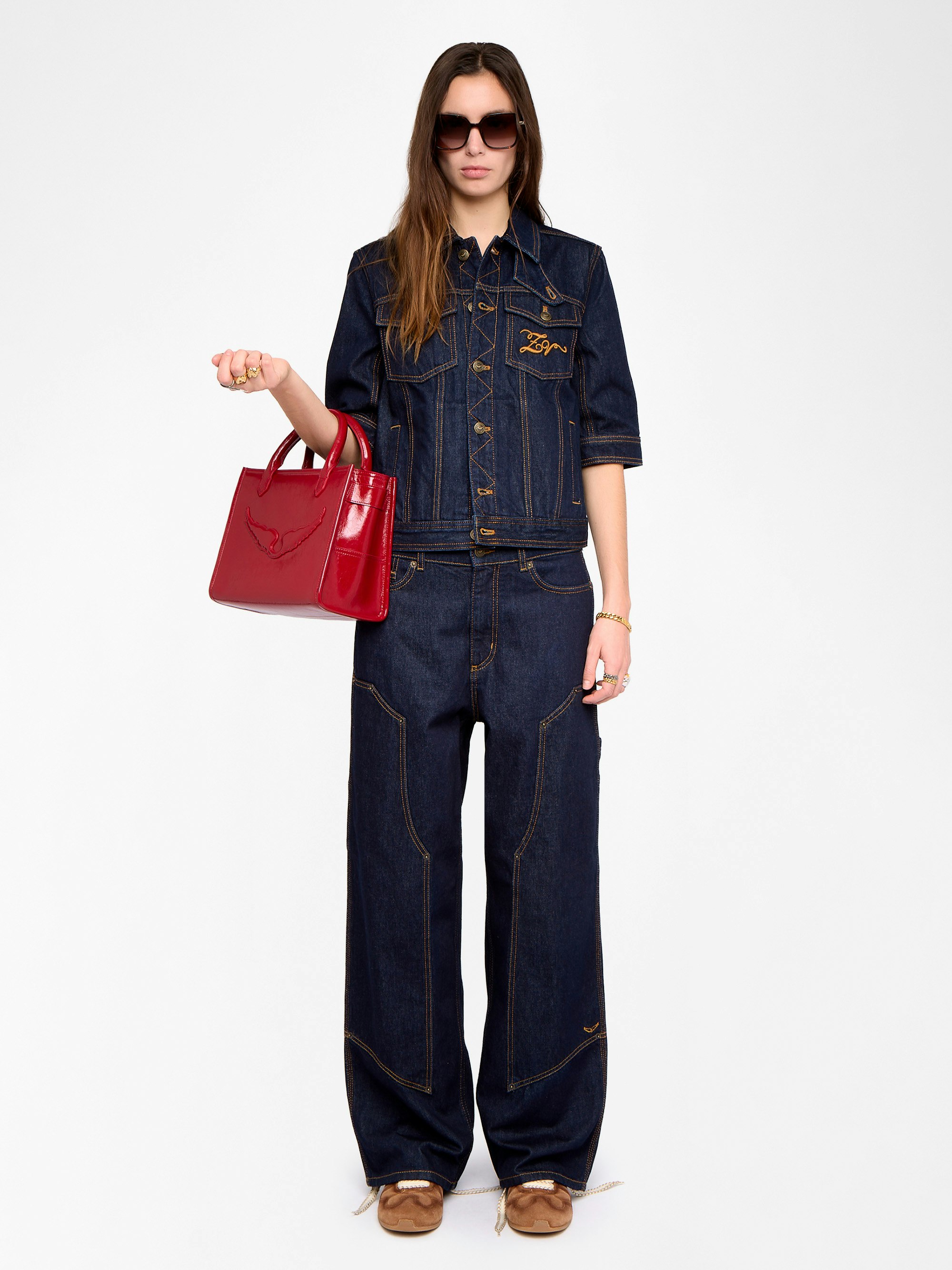 Kyo Denim Jacket - Short-sleeved denim jacket with button fastenings, removable flap and multiple pockets.