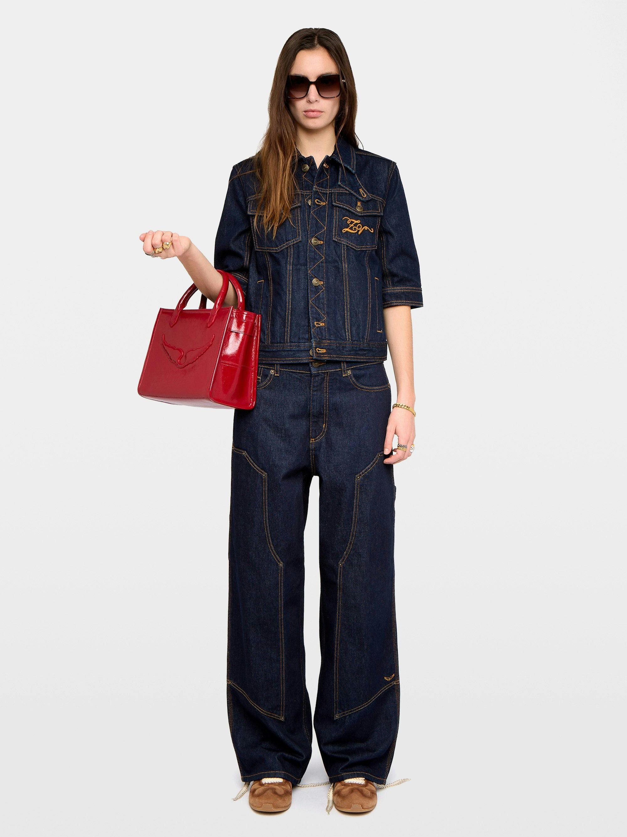 Kyo Denim Jacket - Short-sleeved denim jacket with button fastenings, removable flap and multiple pockets.