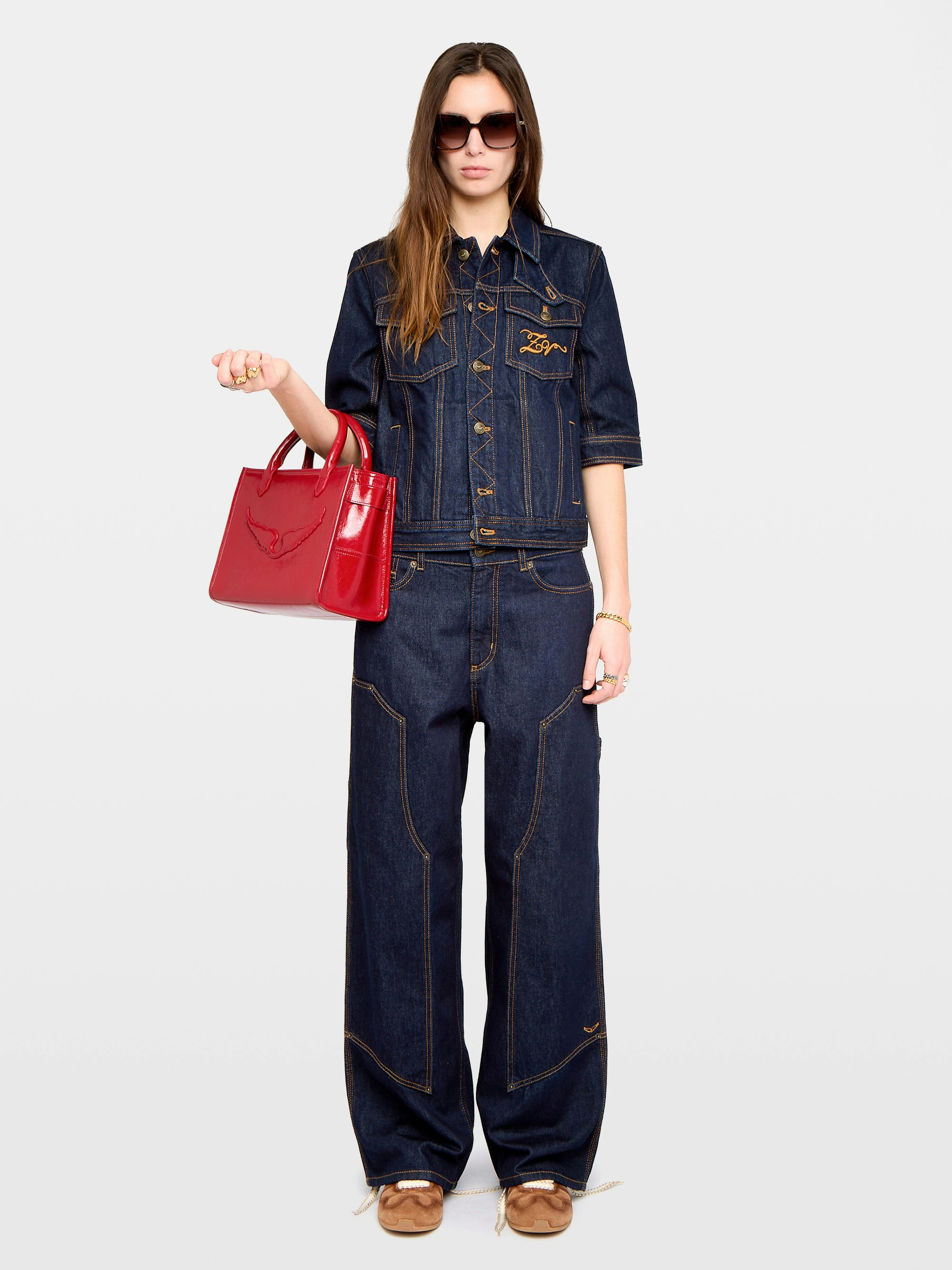 Kyo Denim Jacket - Short-sleeved denim jacket with button fastenings, removable flap and multiple pockets.