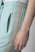 Pantaloni Pomy - Pantaloni in crêpe celeste con strisce laterali paillettate - Donna
