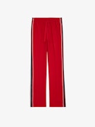 Pomy Pants - Red crêpe pants with glittery side bands and drawstring ties.
