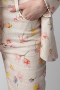 Pantaloni Pistol in lino - Pantaloni svasati in lino ecru con stampa floreale - Donna