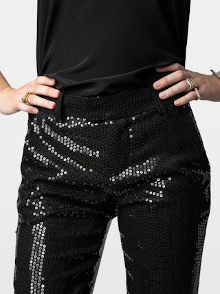 Pantaloni Prune - Pantaloni sartoriali con paillettes, tasche e orli con zip.