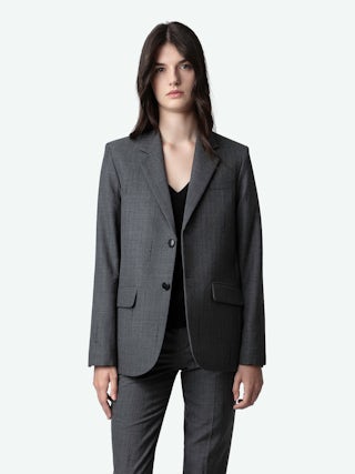 Pantalon Prune - Pantalon de tailleur anthracite à rayures, monogramme et ourlets zippés.