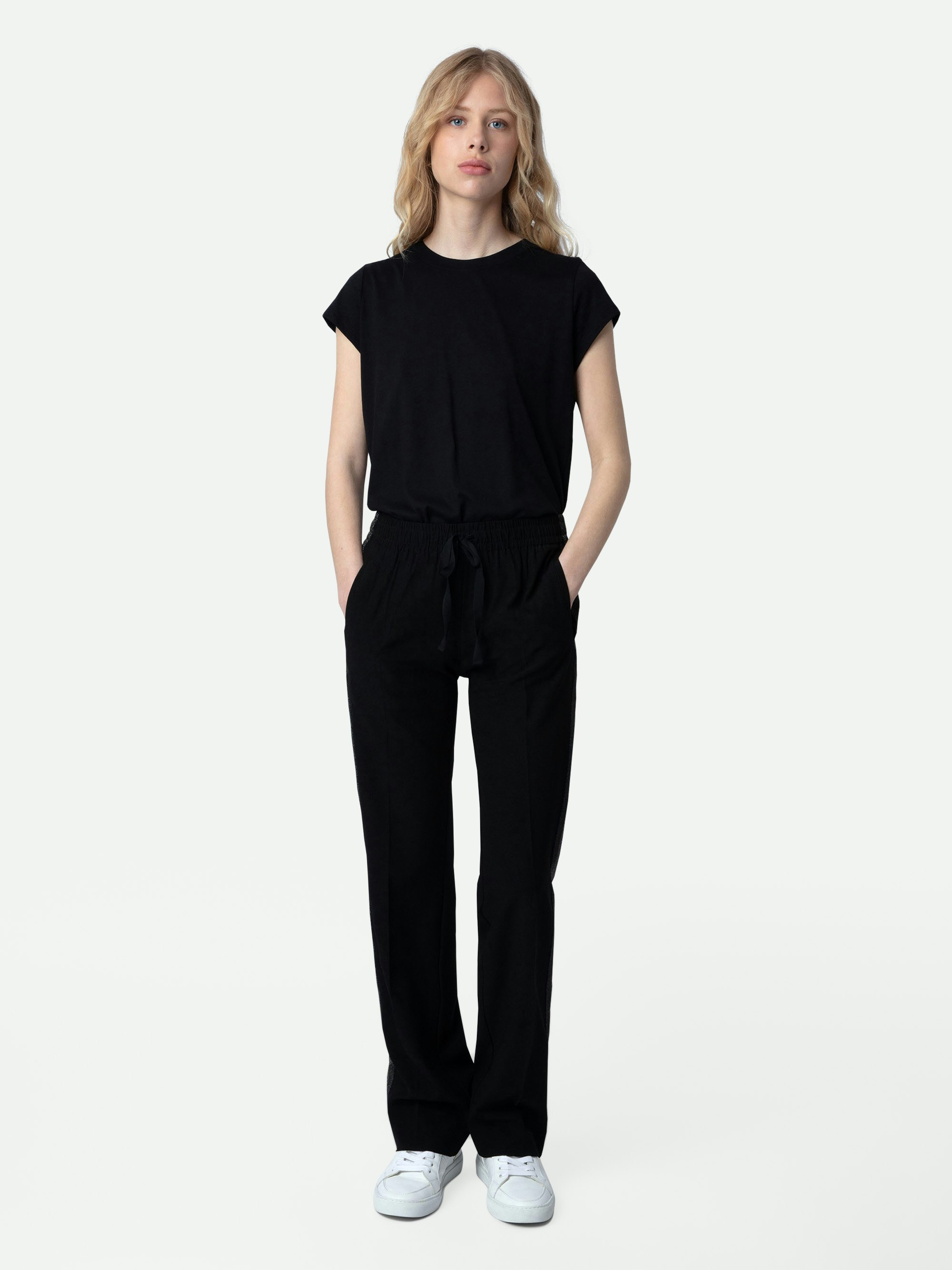 Pantalón Pomy - Pantalón negro para mujer con bandas laterales de purpurina