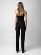 Pantalon Pura - Pantalon de tailleur large noir à fines rayures et poches.