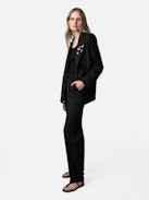 Pantalon Pura - Pantalon de tailleur large noir à fines rayures et poches.