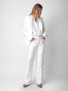 Pistol Pants - White linen flared tailored pants with pockets and pleats.