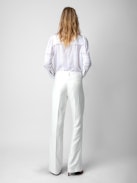 Pistol Pants - White linen flared tailored pants with pockets and pleats.