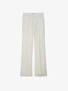 Pistol Pants - White linen flared tailored pants with pockets and pleats.