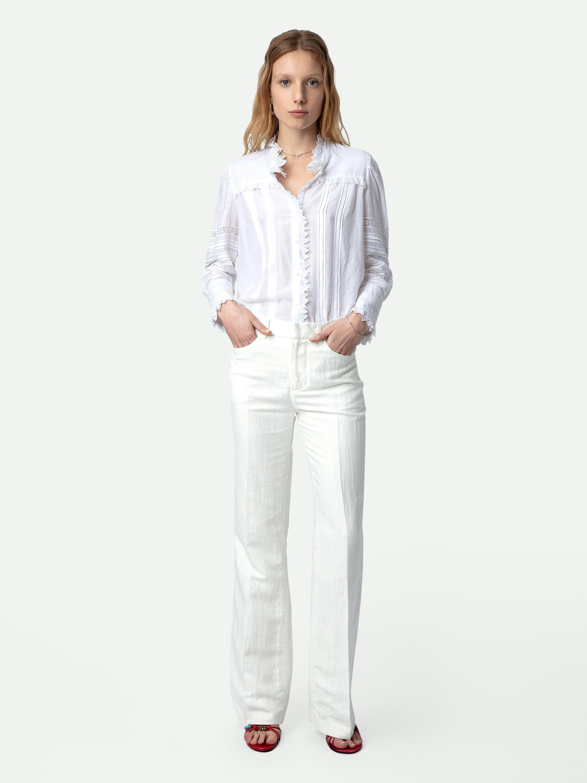 Pantaloni Pistol - Pantaloni sartoriali svasati in lino bianchi con tasche e pieghe.