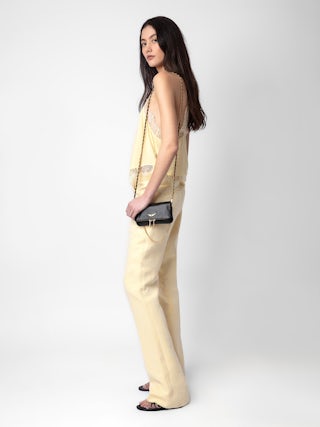 Pantalon Pistol - Pantalon de tailleur évasé en lin jaune clair à poches et plis.