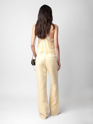 Pantalon Pistol - Pantalon de tailleur évasé en lin jaune clair à poches et plis.
