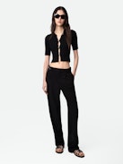 Pura Trousers - Black crêpe tailored trousers with pockets and hems.