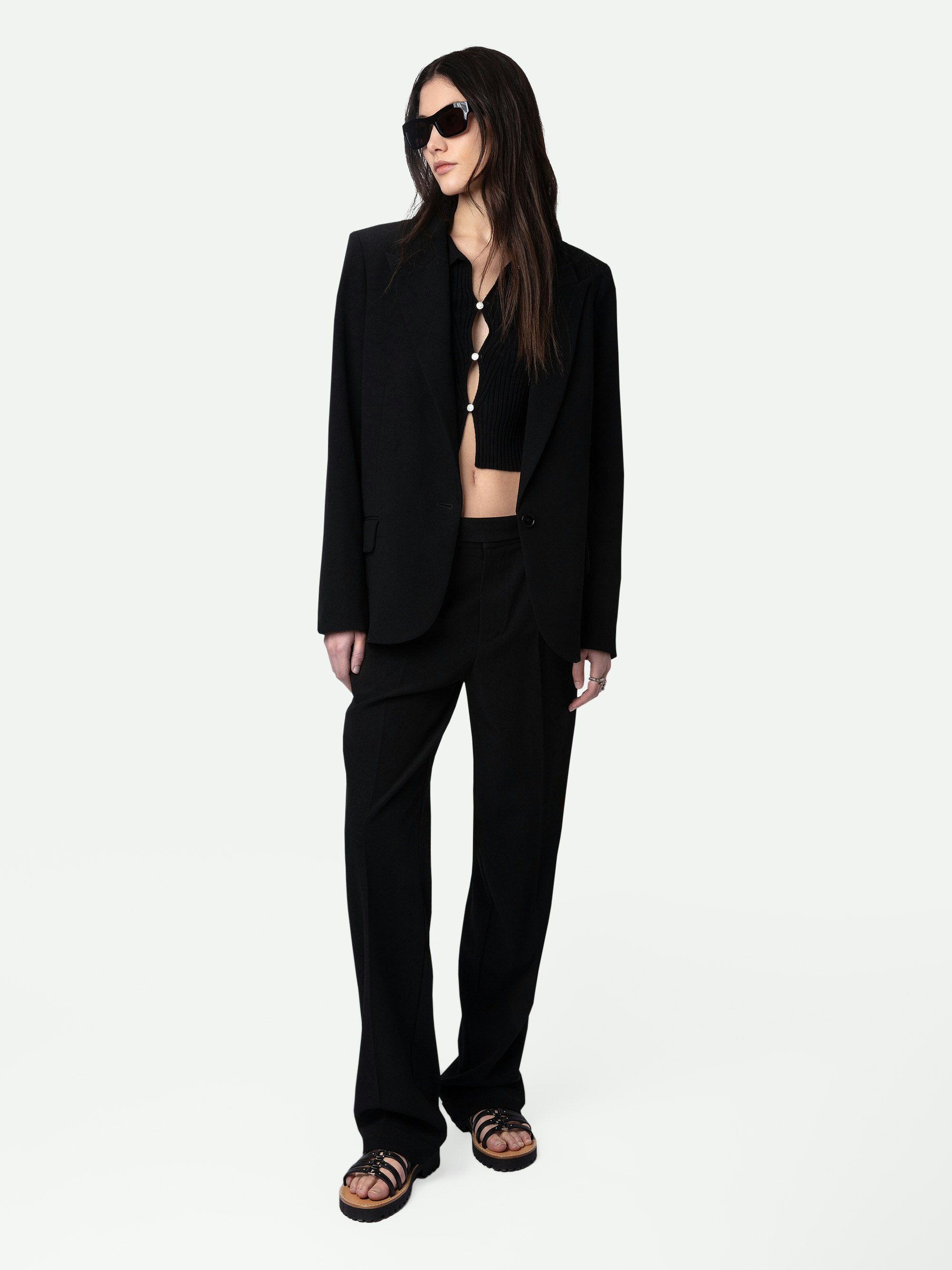 Pura Trousers - Black crêpe tailored trousers with pockets and hems.