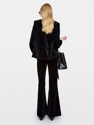 Prevy Velours Trousers - Tailored trousers in smooth velvet, low-waisted, flared and multi-pocket.