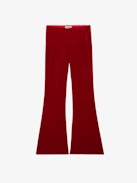 Prevy Velvet Pants - Flared red velvet pants with a mid-rise waist and pockets.
