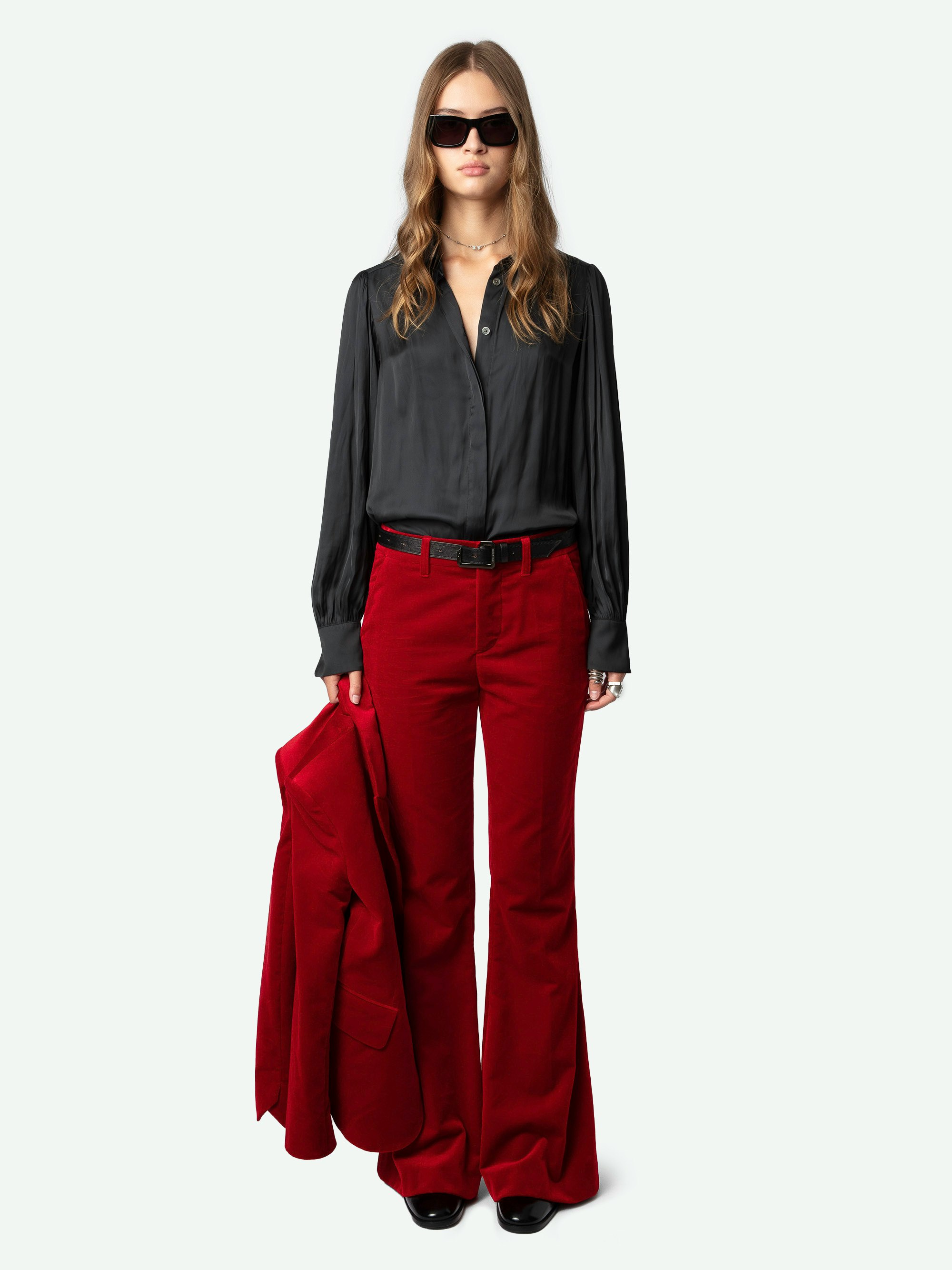 Prevy Velvet Pants - Flared red velvet pants with a mid-rise waist and pockets.