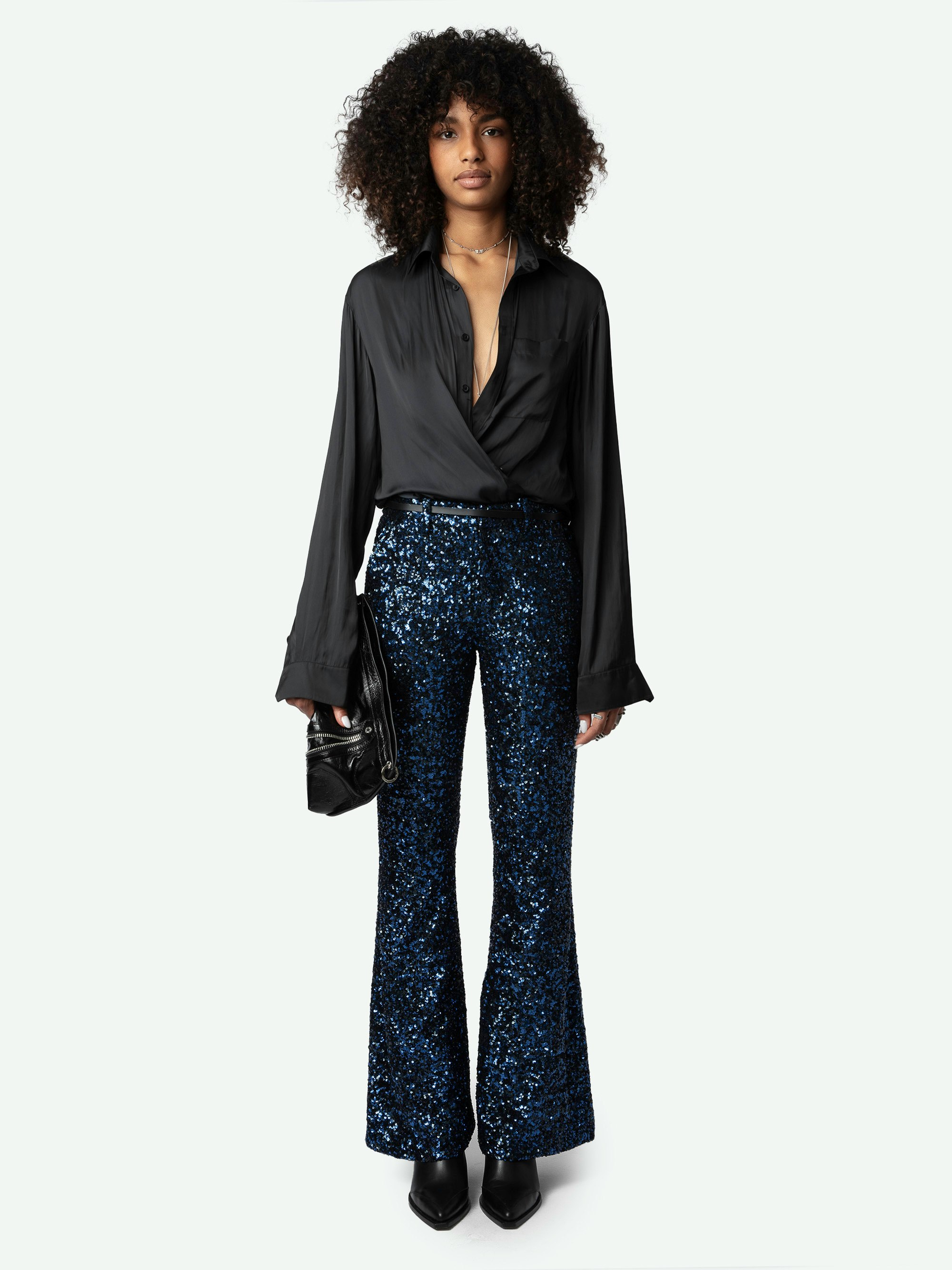 Prevy Sequin Pants - Dark blue flared pants with sequins, mid-rise waist and pockets.