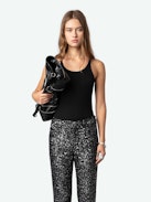 Pantaloni Prevy Lustrini - Pantaloni a zampa neri con lustrini argentati, gambe svasate, vita medio-alta e tasche.
