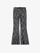 Pantaloni Prevy Lustrini - Pantaloni a zampa neri con lustrini argentati, gambe svasate, vita medio-alta e tasche.