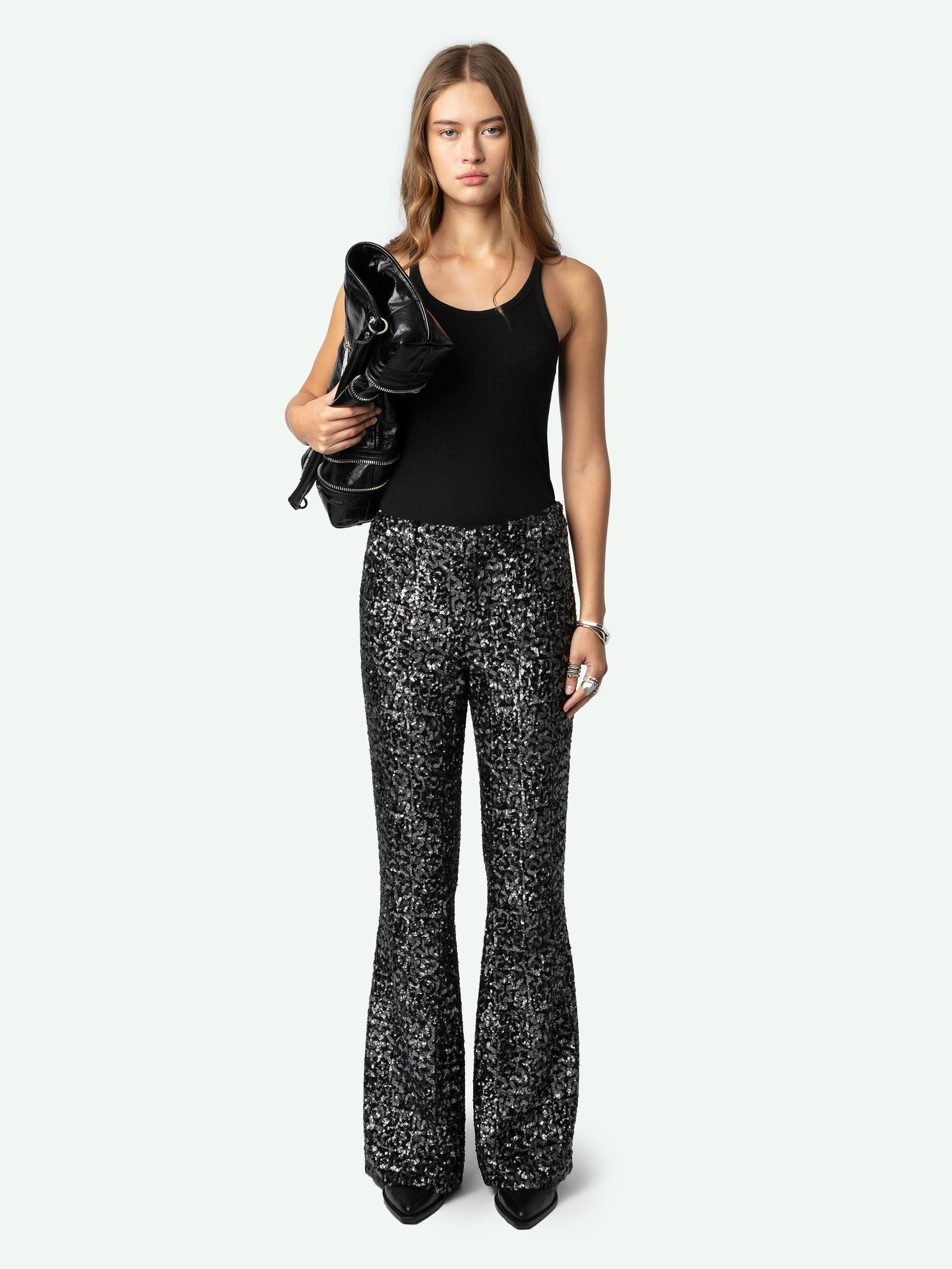 Prevy Sequin Pants - Black flared pants with silver sequins, mid-rise waist and pockets.