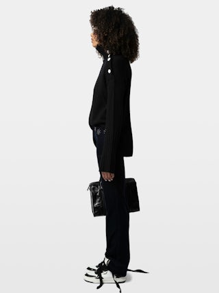 Pantaloni Pista Velluto - Pantalone dritto in velluto a coste con tasche ornate di borchie a fiori e fondo leggermente svasato.