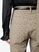 Pistol Pants - Tailored and flared women's check pants with flocked polka dots and pockets.