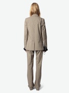 Pistol Pants - Tailored and flared women's check pants with flocked polka dots and pockets.