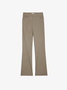 Pistol Pants - Tailored and flared women's check pants with flocked polka dots and pockets.